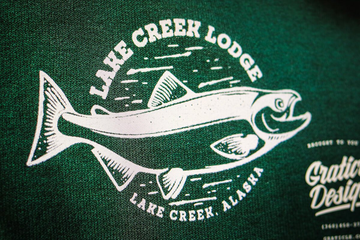 Photo of a logo on a sweatshirt for a hunting lodge in Alaska called Lake Creek Lodge