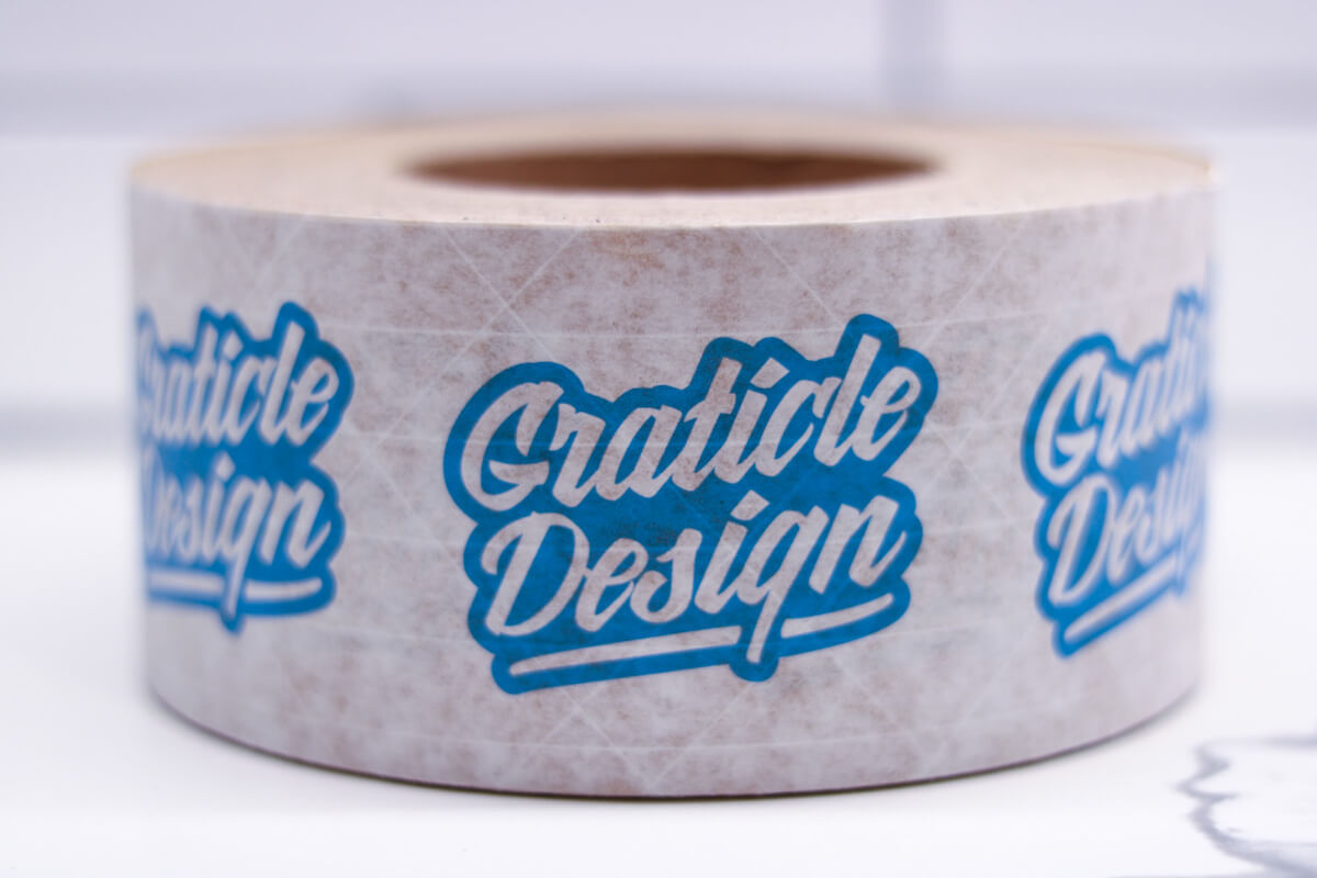 Photo of packaging tape with Graticle's logo on it